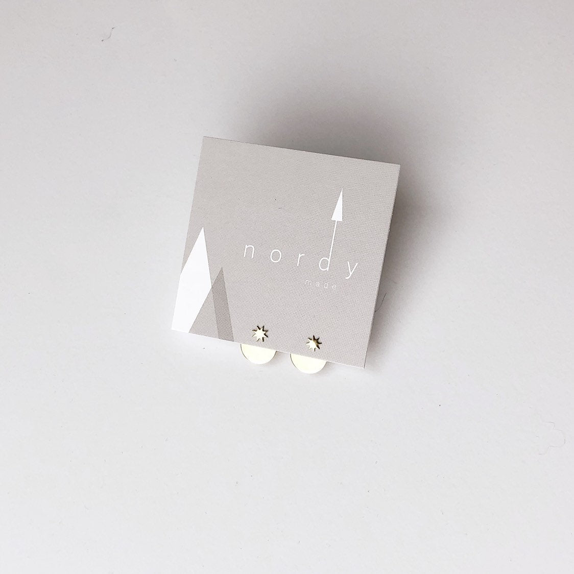 NORR star ear jacket earrings