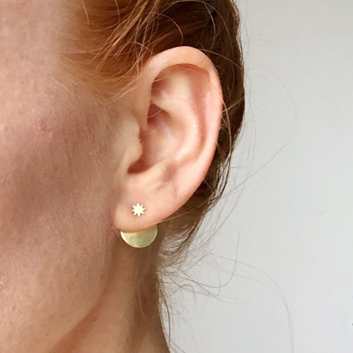 NORR star ear jacket earrings