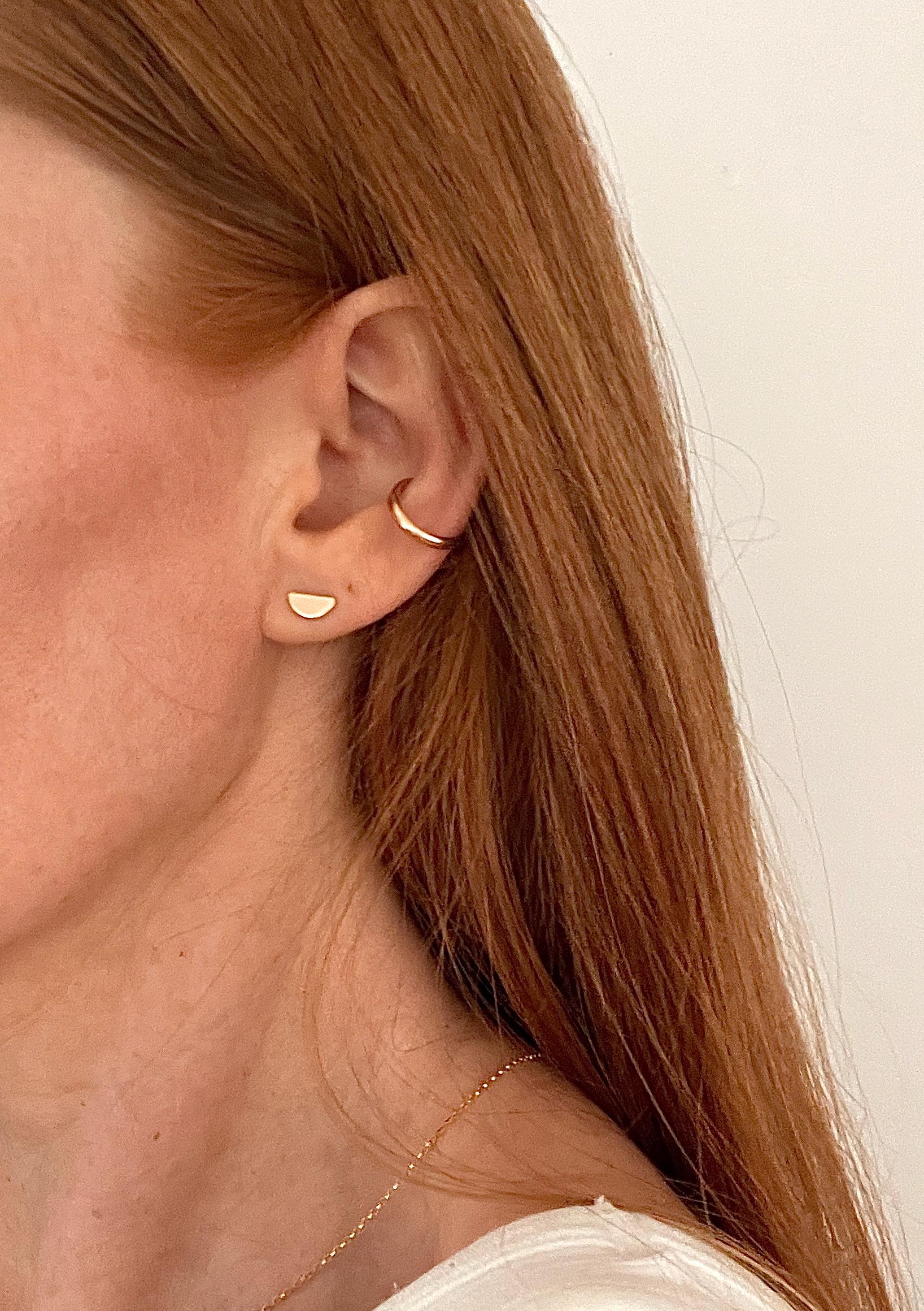 Photo shows the 1/2 moon studs worn alone without the jacket. They can be worn in any rotation, upright, upside down or vertical. Also pictured, is the KATA 1/2 round ear cuff.